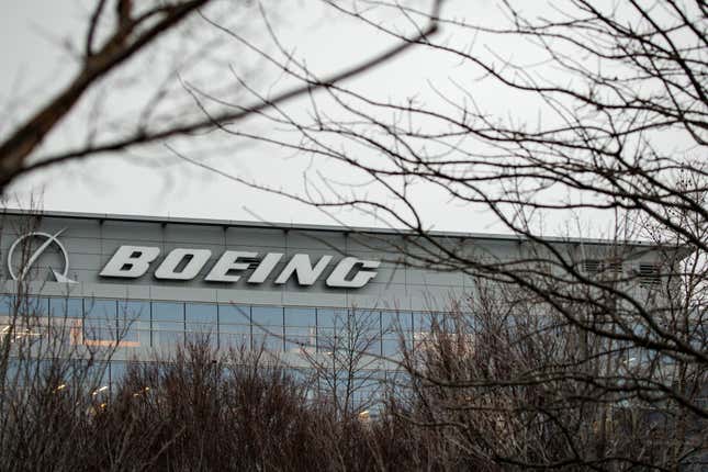 The headquarters for The Boeing Compay viewed through some trees