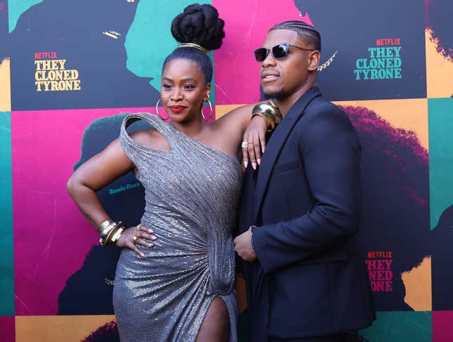 Teyonah Parris, left and John Boyega attend the Netflix Premiere of “They Cloned Tyrone” on June 27, 2023 in Los Angeles, California.