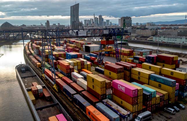 FILE - Containers are pictured in the small harbour in Frankfurt, Germany, Tuesday, Feb. 13, 2024. The German government said Europe&#39;s largest economy was in “troubled waters” and slashed its growth forecast for this year as it struggles with a lack of skilled labor, excessive bureaucracy, high interest rates and lagging investment in new projects — while a relatively modest set of tax breaks for business remains blocked in the legislature. (AP Photo/Michael Probst, File)