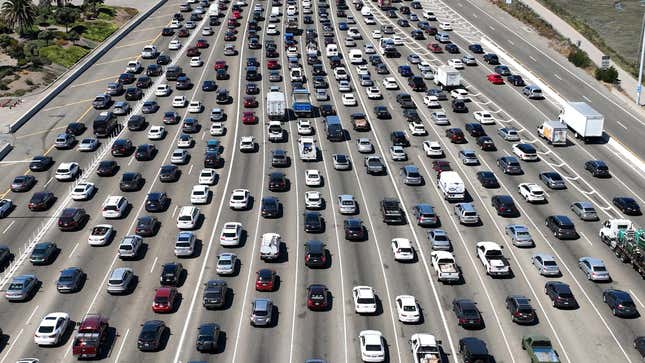 OAKLAND, CALIFORNIA - AUGUST 24: Traffic backs up at the San Francisco-Oakland Bay Bridge toll plaza on August 24, 2022 in Oakland, California. California is set to implement a plan to prohibit the sale of new gasoline-powered cars in the state by 2035 in an effort to fight climate change by transitioning to electric vehicles. 