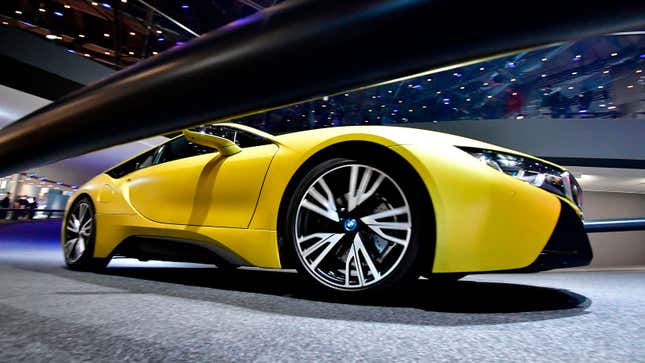 A yellow concept car with low-profile tires 