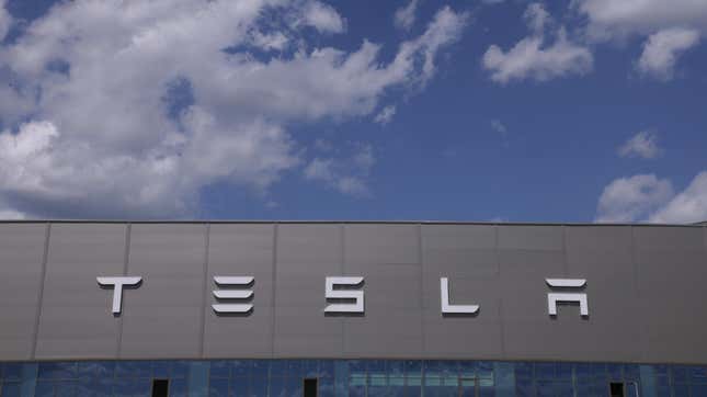 The Tesla logo adorns the facade of a building at the Tesla factory on July 17, 2023 near Gruenheide, Germany.