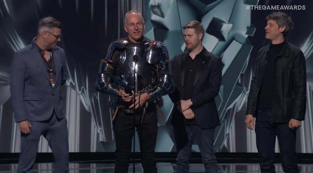 Larian Studios devs stand on stage at The Game Awards 2023. 