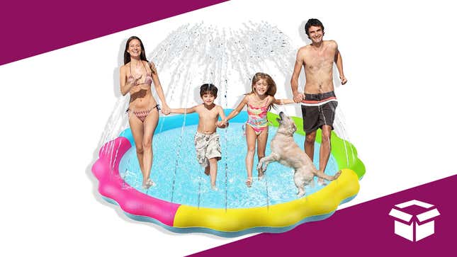 A family enjoying splashing around in the splash pad.