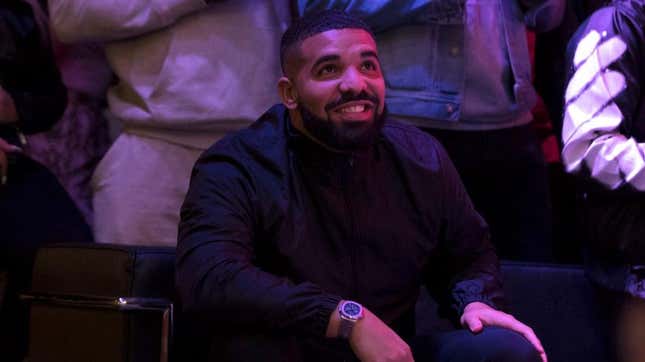 Drake watching basketball