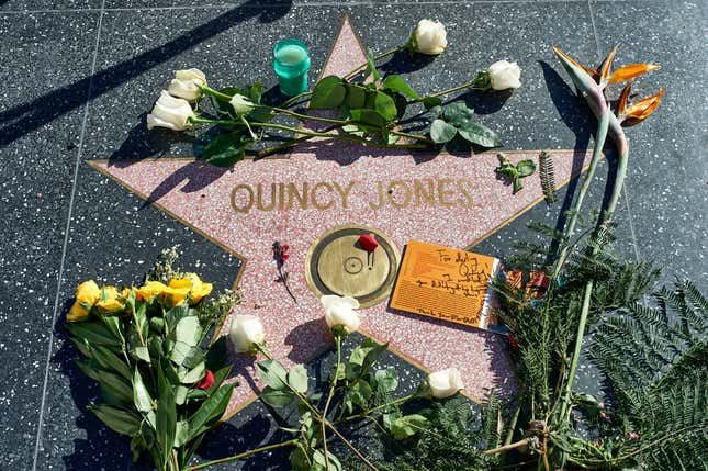 HOLLYWOOD, CALIFORNIA - NOVEMBER 04: Flowers are seen on the Hollywood Walk of Fame star of Quincy Jones on November 04, 2024 in Hollywood, California. 