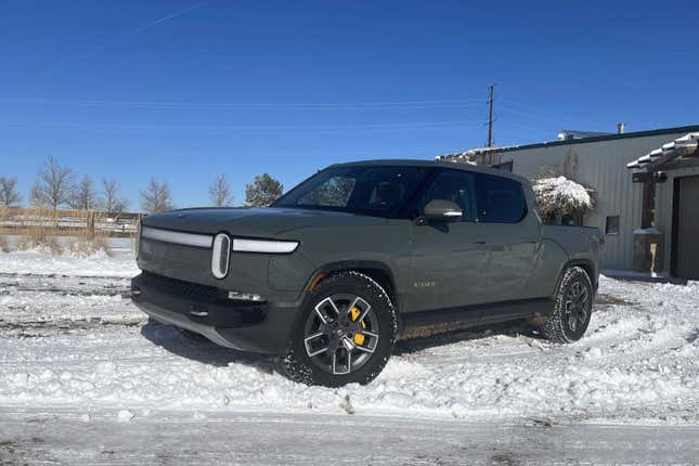 This photo provided by Edmunds shows a Rivian R1T electric pickup near Boulder, Colorado. Many of the potential problems of driving an electric vehicle in cold weather can be offset by planning ahead. (Emme Hall/Edmunds via AP)