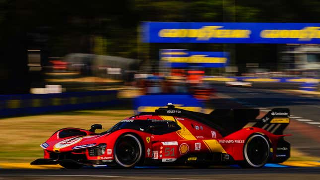 A photo of the Ferrari 499P racing at Le Mans. 