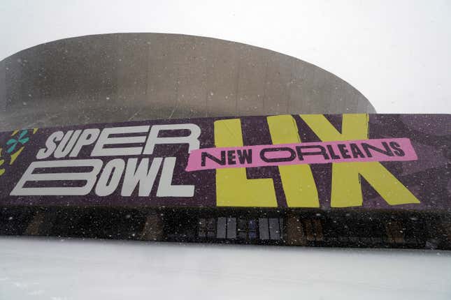 Snow falls on Super Bowl LIX signage on the outside of Caesars Superdome on January 21, 2025 in New Orleans, Louisiana