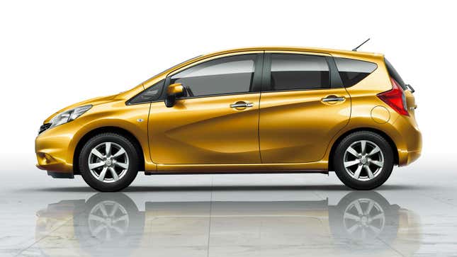 A gold Nissan Note hatchback 