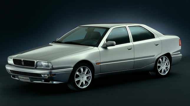 Front 3/4 view of a silver Maserati Quattroporte IV