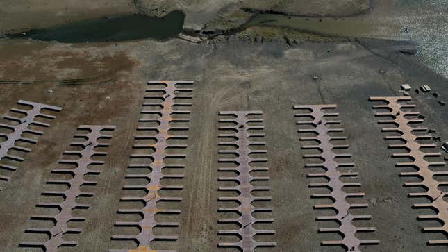  In an aerial view, boat docks at the Browns Ravine Cove sit on dry earth at Folsom Lake on May 10, 2021 in El Dorado Hills, California. 