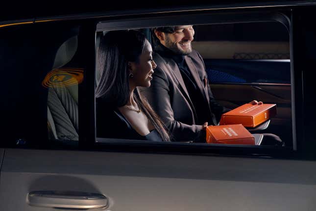 Image for article titled New York's Hottest New Restaurant Is... Takeout In The Back Seat Of The Cadillac Escalade IQ