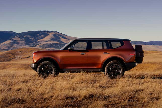 Side view of an orange Scout Traveler