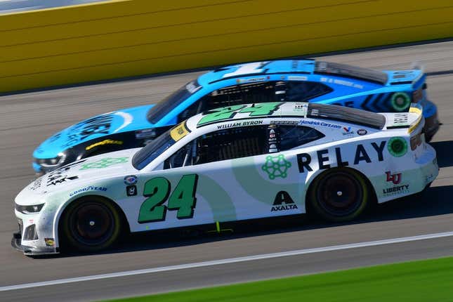 Oct 15, 2023; Las Vegas, Nevada, USA; NASCAR Cup Series driver William Byron (24) drives for position against driver Ross Chastain (1) during the South Point 400 at Las Vegas Motor Speedway.