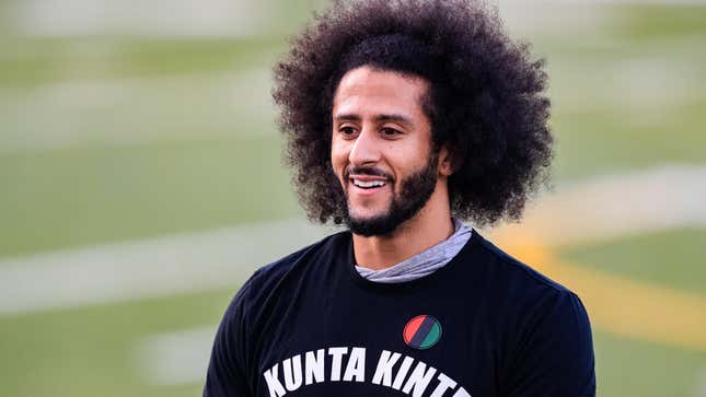 Colin Kaepernick looks on during his NFL workout held at Charles R Drew high school on November 16, 2019 in Riverdale, Georgia.