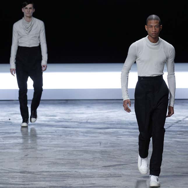 Models present creations by US designer Rick Owens during the Autumn-Winter 2012/2013 ready-to-wear men's fashion collection show on January 19, 2012 in Paris.