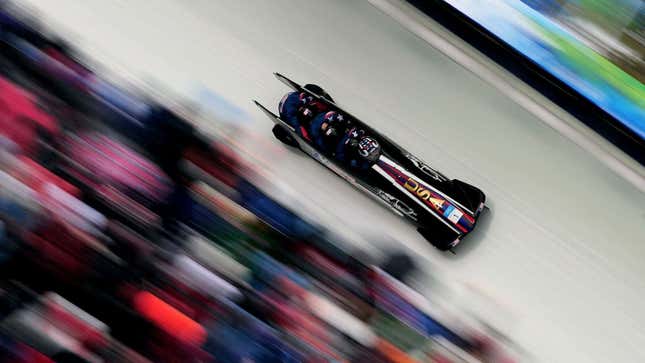 A Team USA bobsled rockets down the ice