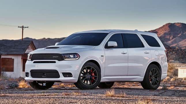 A photo of a white Dodge Durango SUV. 