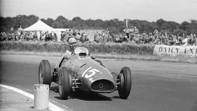 A black and white photo of Alberto Ascari racing in F1. 