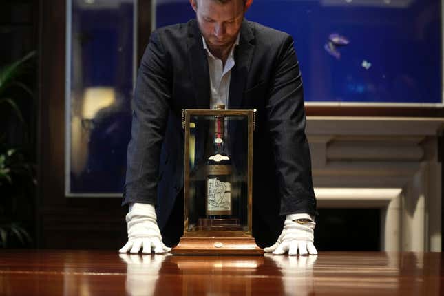 FILE - A view of a bottle of Macallan Adami 1926 whisky, on display during a media preview at Sotheby&#39;s auction house, in London, Thursday, Oct. 19, 2023. A bottle of Scotch whisky billed as “the most sought-after” in the world sold on Saturday, Nov. 18, 2023 for almost 2.2 million pounds ($2.7 million), an auction record for a bottle of wine or spirits. The Macallan Adami 1926 sold at Sotheby’s in London, after a bidding war between would-be buyers on the phone and in the room. (AP Photo/Kin Cheung, File)