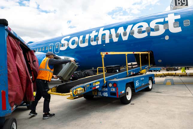 Baggage being loaded on a Southwest Airlines plane in Baltimore, Maryland