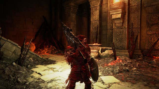 The player character in Elden Ring holds a massive sword.