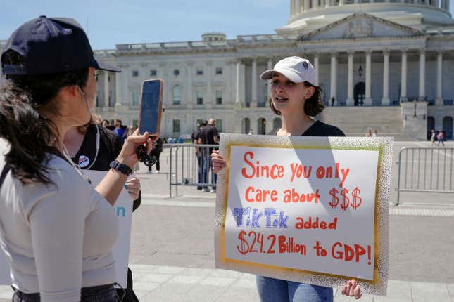 A TikTok content creator, speaks to reporters outside the U.S. Capitol, Tuesday, April 23, 2024, in Washington, as Senators prepare to consider legislation that would force TikTok&#39;s China-based parent company to sell the social media platform under the threat of a ban, a contentious move by U.S. lawmakers. (AP Photo/Mariam Zuhaib)