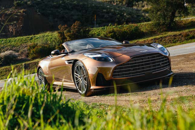 Front 3/4 view of a brown Aston Martin DB12 Volante