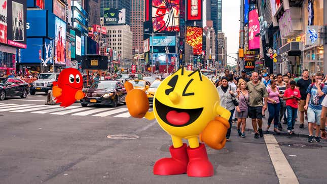 A big, human-sized Pac-Man gives a thumbs up in the middle of New York City. 