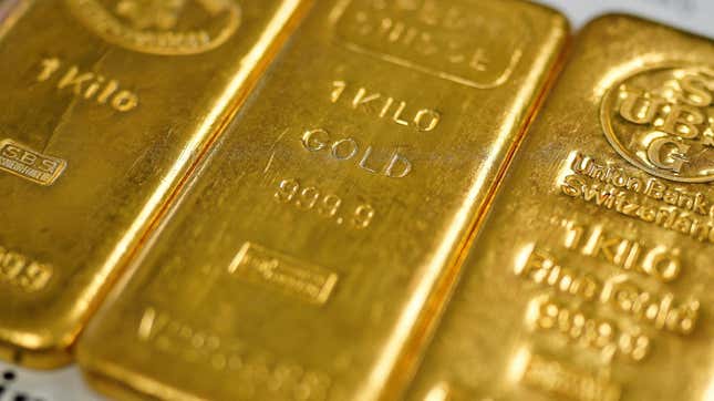 Gold prices hit a record high as investors fear inflation, interest rates