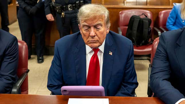 Image for article titled Trump Watching Movie On iPad During Trial Without Using Headphones