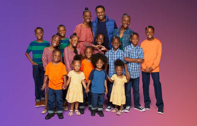 Karen and Deon Derrico (center) with their fourteen children. 