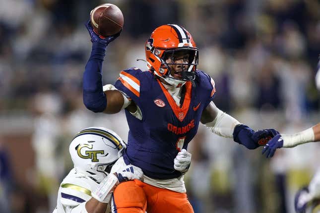 Nov 18, 2023; Atlanta, Georgia, USA; Syracuse Orange running back LeQuint Allen (1) is pressured by Georgia Tech Yellow Jackets linebacker Trenilyas Tatum (7) in the second half at Bobby Dodd Stadium at Hyundai Field.