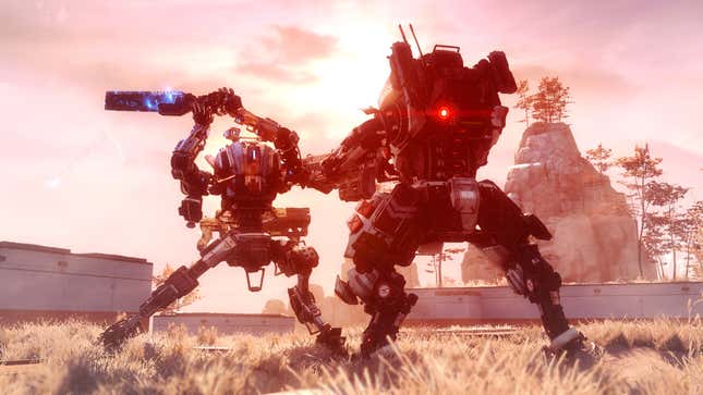 Two giant robots fighting at sunset in Titanfall 2.