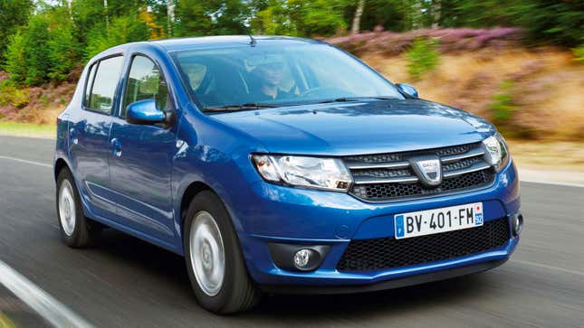 A photo of a blue Dacia Sandero hatchback driving along a road. 