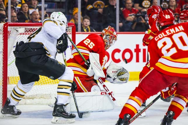 Feb 22, 2024; Calgary, Alberta, CAN; Calgary Flames goaltender Jacob Markstrom (25) makes a save against the Boston Bruins during the first period at Scotiabank Saddledome.