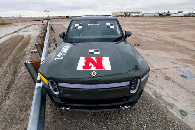 A 2022 Rivian R1T is used for a crash test research by the U.S. Army Corps of Engineers and Development Center and the University of Nebraska-Lincoln&#39;s Midwest Roadside Safety Facility on Oct. 12, 2023 in Lincoln, Neb. Preliminary tests point to concerns that the nation’s roadside guardrails are no match for new heavy electric vehicles. (Craig Chandler/University of Nebraska via AP)