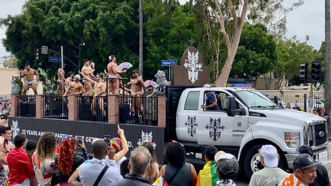 A photo of the Abbey's truck loaded with gogo dancers in speedos