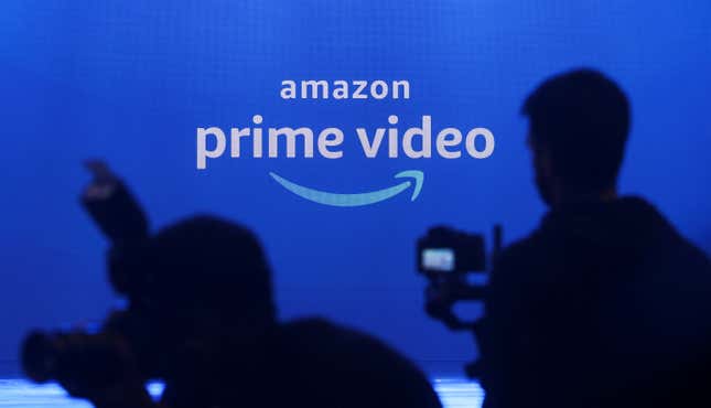 Media are seen in front of an Amazon Prime Video logo