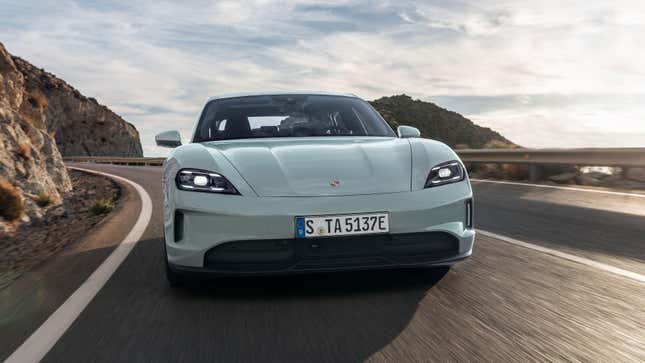 A 2024 Porsche Taycan on a coastal road