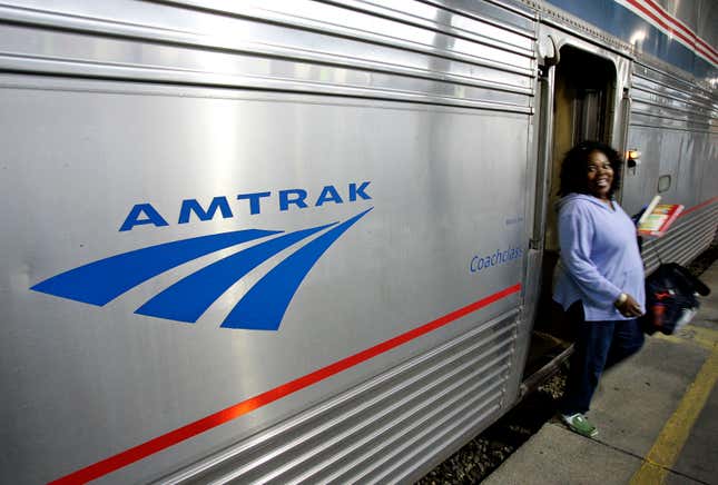 FILE - A passenger disembarks from Amtrak&#39;s Sunset Limited at its final stop in New Orleans, Nov. 2, 2008. The Biden administration announced Monday, Sept. 25, 2023, that it has awarded more than $1.4 billion to projects that improve railway safety and boost capacity, with much of the money coming from the 2021 infrastructure law. (AP Photo/Pat Semansky, File)