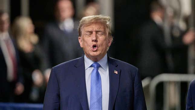 Former U.S. President Donald Trump speaks to the media at the end of the day during his trial for allegedly covering up hush money payments at Manhattan Criminal Court on April 26, 2024 in New York City.