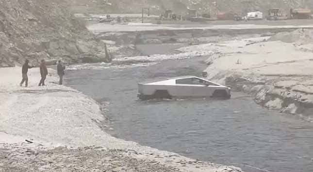 Screenshot from a viral video showing a Cybertruck failing spectacularly to cross a river
