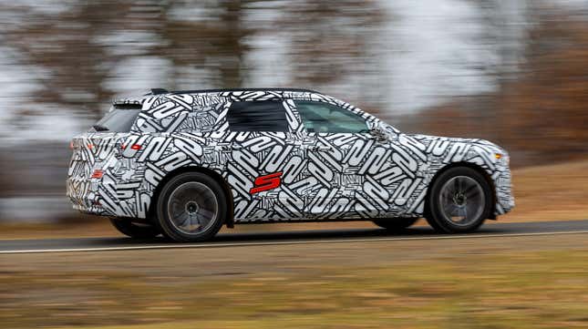 A camouflaged 2024 Acura ZDX Type S. 