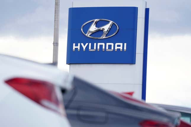 FILE - The Hyundai company logo hangs over a long row of cars at a car dealership in Centennial, Colo., Sunday, Dec. 20, 2020. Hyundai and LG Energy Solution are spending an additional $2 billion and hiring an extra 400 workers to make batteries at the automaker&#39;s sprawling U.S. electrical vehicle plant that&#39;s under construction in Georgia according to an announcement Thursday, Aug. 31, 2023. (AP Photo/David Zalubowski, File)