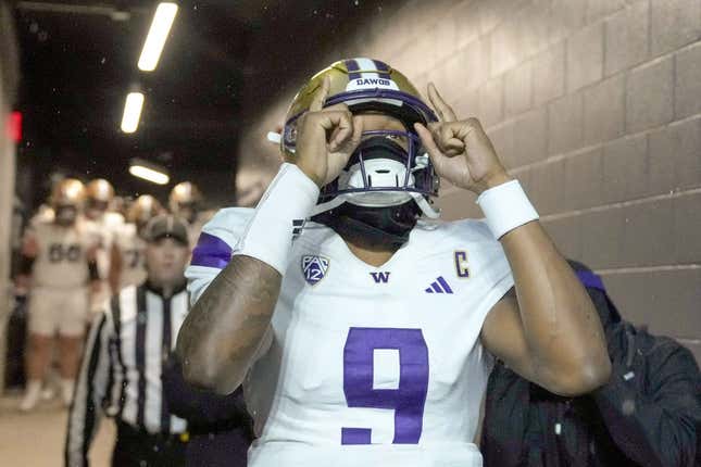 Nov 18, 2023; Corvallis, Oregon, USA; Washington Huskies  quarterback Michael Penix Jr. (9) walks out of the team tunnel before the game against the Oregon State Beavers at Reser Stadium.