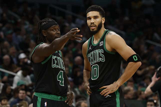 Nov 1, 2023; Boston, Massachusetts, USA; Boston Celtics guard Jrue Holiday (4) talks with forward Jayson Tatum (0) during the second half against the Indiana Pacers at TD Garden.