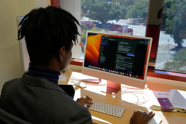 Post-doctoral researcher Tofunmi Omiye looks over chatbots in his office at the Stanford School of Medicine in Stanford, Calif., Tuesday, Oct. 17, 2023. A new study, co-led by Omiye, cautions that popular chatbots are perpetuating racist, debunked medical ideas, prompting concerns that the tools could worsen health disparities for Black patients. (AP Photo/Eric Risberg)