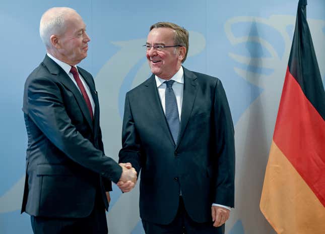 Boris Pistorius, Federal Minister of Defense, right, meets his Israeli counterpart, Joav Galant in Berlin, Thursday Sept. 28, 2023. Israel and Germany have signed an agreement on the purchase of the Israeli Arrow 3 missile defense system by Berlin. (Britta Pedersen/dpa via AP)